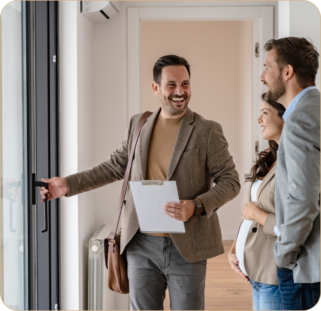 Realtor welcoming clients into property