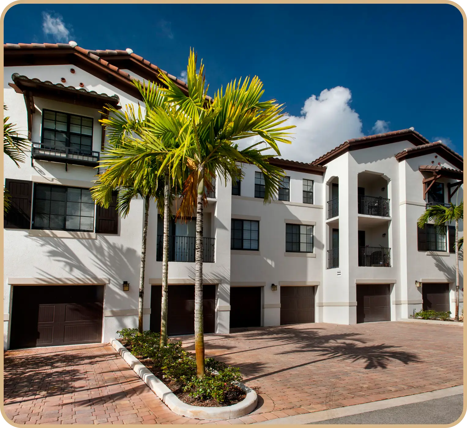Modern apartment building with palm trees